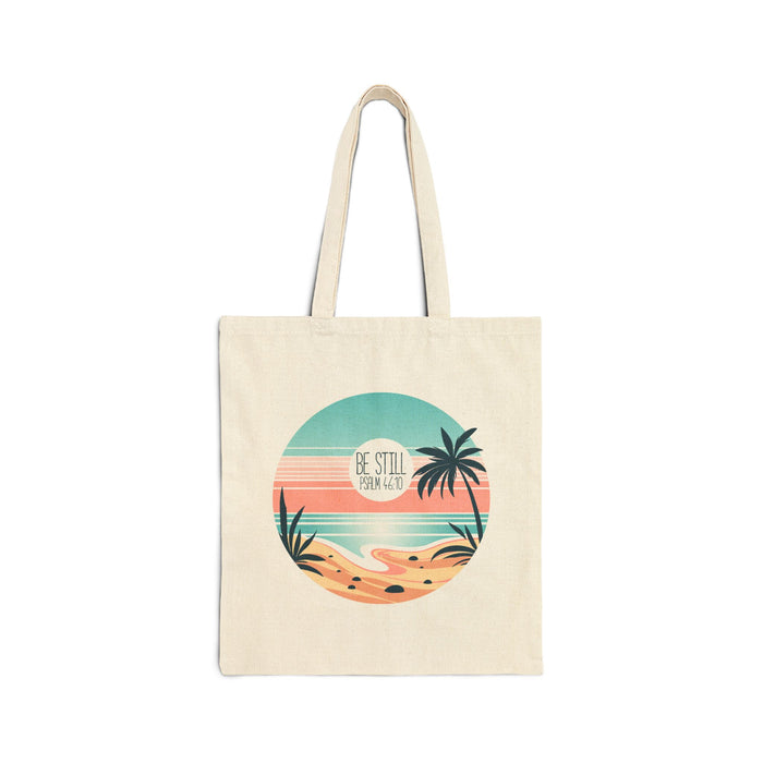 Be Still Tote Bag in natural canvas featuring serene Psalm 46:10 beach illustration