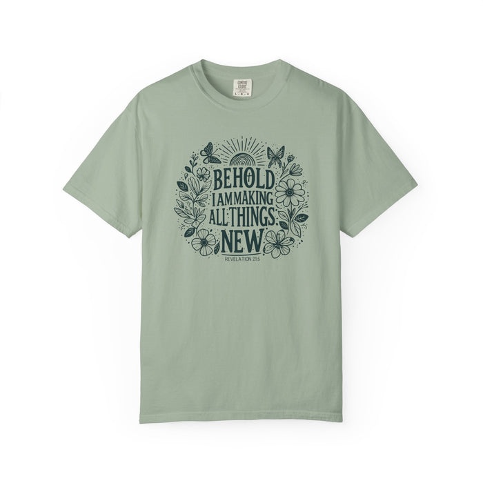 Behold Premium Tee, front view showing botanical Revelation 21:5 design, bay