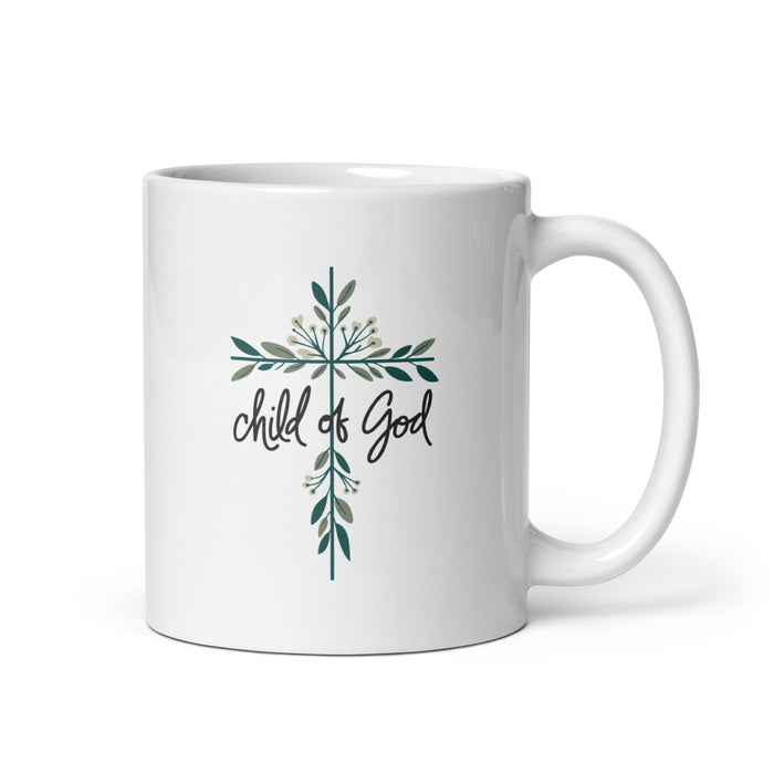 Child of God Floral Cross Mug featuring botanical cross design on white ceramic