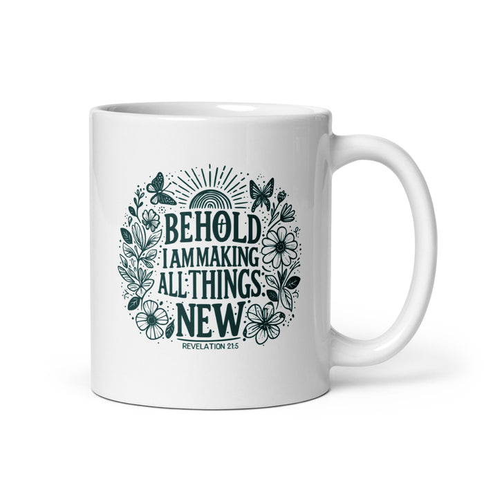 Behold Mug featuring floral Revelation 21:5 design on white ceramic